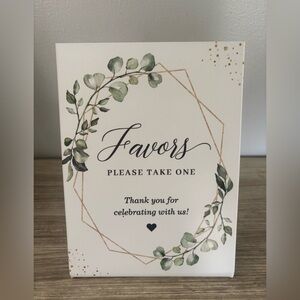 Elegant Pedestal Sign with Greenery for Favors